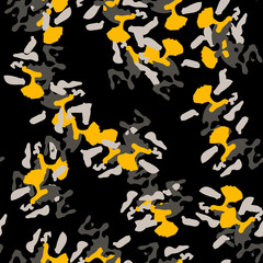 Urban UFO camouflage of various shades of grey, black and yellow colors
