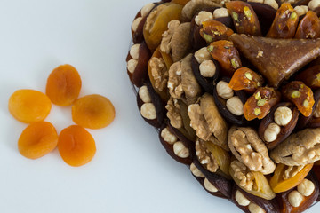 the special dried fruits and nuts plate concept for store seller. dried apricot,fig ,hazelnut, nut,special Turkish east food.