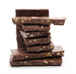Chocolate with hazelnuts isolated on white background