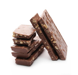 Chocolate with hazelnuts isolated on white background