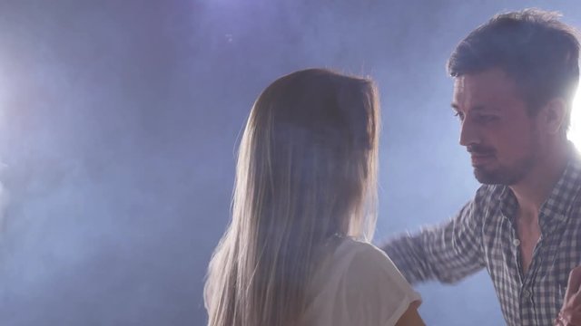 Concept of social dance and relationships. beautiful young couple dancing sensual bachata
