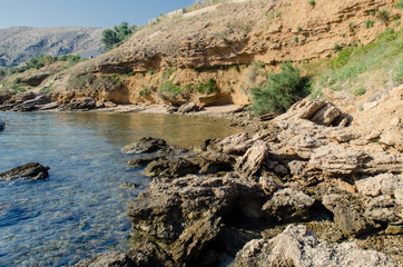 Beach beneath cliffs