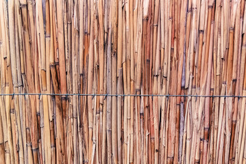 Hay or dry grass background. Thatch roof for background, dried straw or cane.