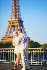 Romantic couple having a date near the Eiffel tower