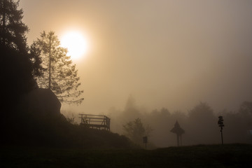 Mystical morning fog landscape with milky sun