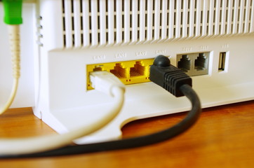 wireless internet router with connecting cables, fiber optic Internet, internet security