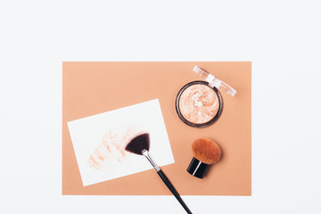 Bronzing powder and brushes for application