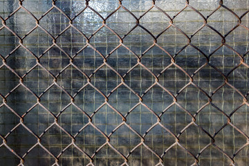 Background, texture from a metal lattice.