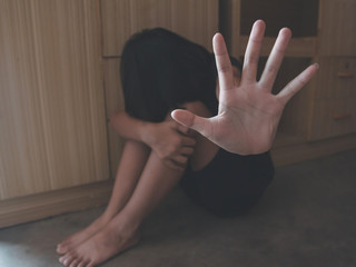 Stop violence and rape concept,concept photo of sexual assault,traumatized young girl