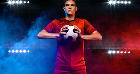 Teenager - soccer player. Boy in football sportswear after game with ball. Sport concept. © Mike Orlov