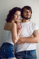 guy and a girl on a white background in the Studio