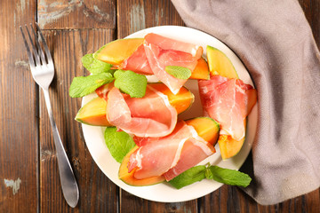 melon slices and ham