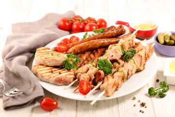 barbecue meat with sausage, skewer and sirloin