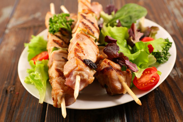 grilled skewer meat and lettuce