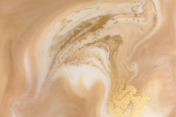 Beige marbling pattern. Golden marble liquid texture.