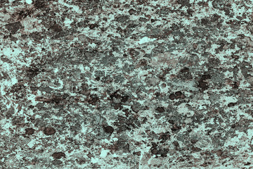 Vintage cyan background. Rough painted wall of hazel color. Imperfect plane of brown colored. Uneven old decorative toned backdrop of blue tint. Texture of azure hue. Ornamental stony surface.