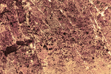 Vintage yellow background. Rough painted wall of aspen gold color. Imperfect plane of golden colored. Uneven old decorative toned backdrop of yellow tint. Texture of gold hue. Ornamental stony surface