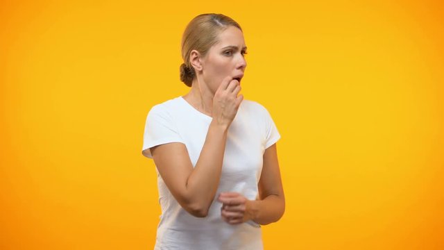 Worried woman looking around, panic attack, fear expression, stress reaction