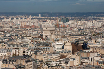 Fototapeta na wymiar An aerial view of the landscape of Paris from the Eiffel tower towards the Arc de Triomphe