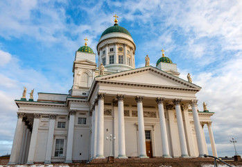 Fototapeta na wymiar Helsinki Cathedral at sunny day and blue sky in background. Finnish lutheran church building in center of city
