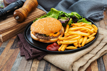 Cheese burger - American cheese burger with Golden French fries