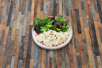 Traditional Parmentier of fish with chives