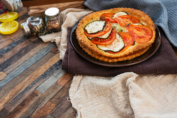 Fine Tomato Zucchini Tarts Mozzarella, pesto and virgin olive oil
