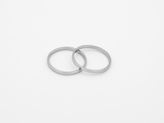 two old silver rings on white background