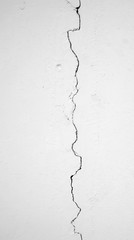 old white wall with crack
