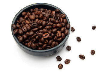 Roasted Coffee beans in a bowl on white background