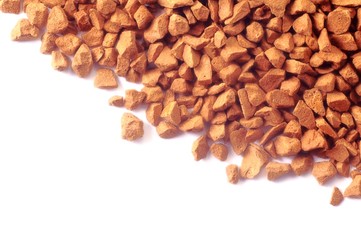 Instant coffee granules on paper. Processed in the editor.