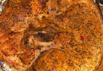 Closeup top view of cooked baked hot spicy pork meat isolated. Horizontal color photography.