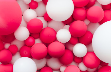 background wall of pink and white balloons