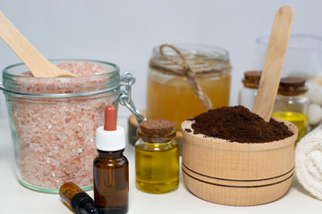 Essential oils and ingredients for homemade cosmetics and scrubs. Skin care concept.