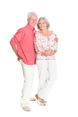 Portrait of happy senior couple posing isolated on white background