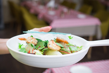woman hand hold italian salad