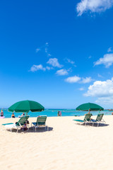 beach chairs and umbrella on the beach