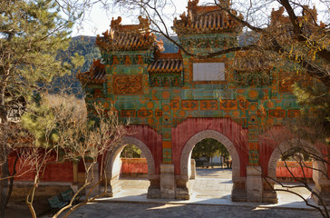 Gate with three arches in park of Putuo Zongcheng temple in China close to Chengde city in Hebei province.