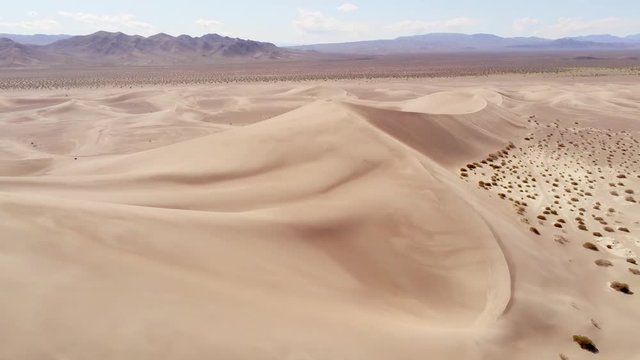 Sand dunes in the desert aerial view from above - aerial photography