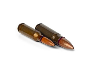 Two old bullets for automatic rifles of 5.45 and 7.62 caliber. Selective focus.