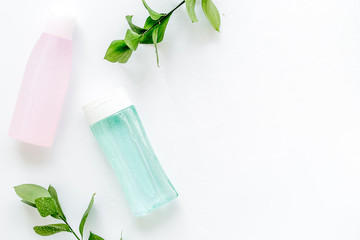 Organic cosmetics for face clearing with facial tonic and mycelial water on white background top...