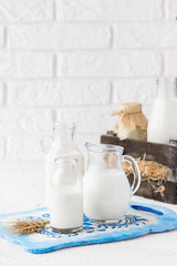 Milk in bottles of various shapes and sizes