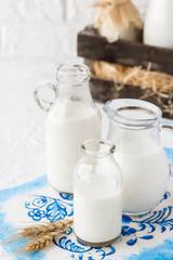 Milk in bottles of various shapes and sizes