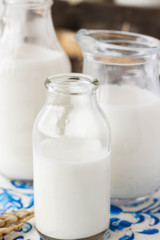 Milk in bottles of various shapes and sizes