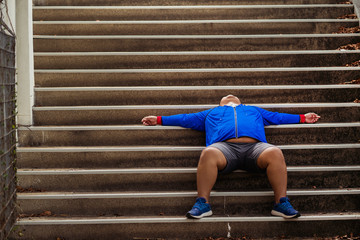 Fat man, he is tired and discouraged From exercise