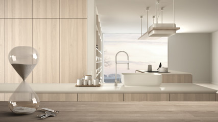 Wooden table top or shelf with minimalistic modern white kitchen with wooden details in contemporary luxury apartment, elegant architecture interior design