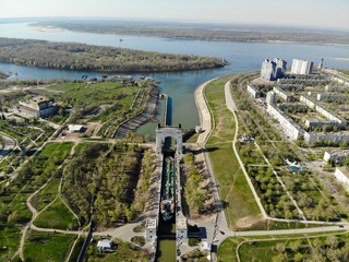Panorama of the city of Volgograd. A cargo ship-tanker loaded with oil passes through the first...