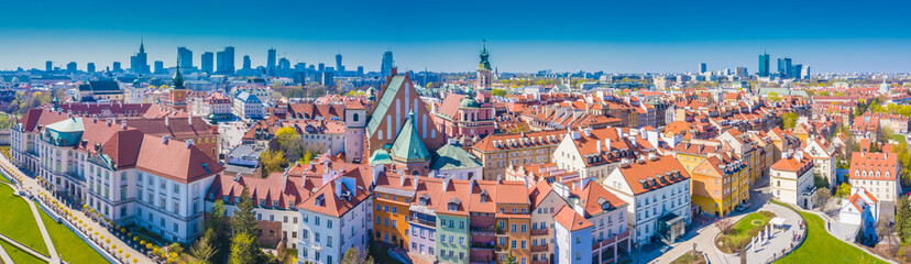 Historic cityscape panorama with high angle view of colorful architecture rooftop buildings in old town market square.