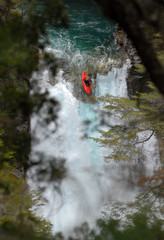 kayaker in the waterfall