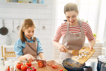 Happy family in the kitchen.